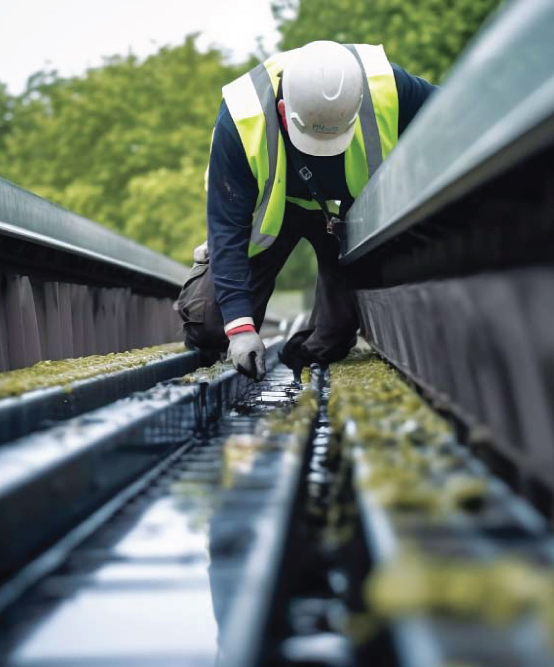 Warehouse Roofing Maintenance - Gutter Maintenance